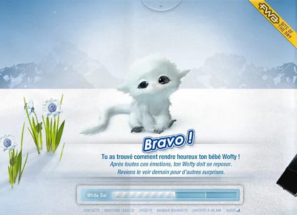Wofty interactive interface displaying a fantastical white creature in a snowy setting, with success message and progress bar