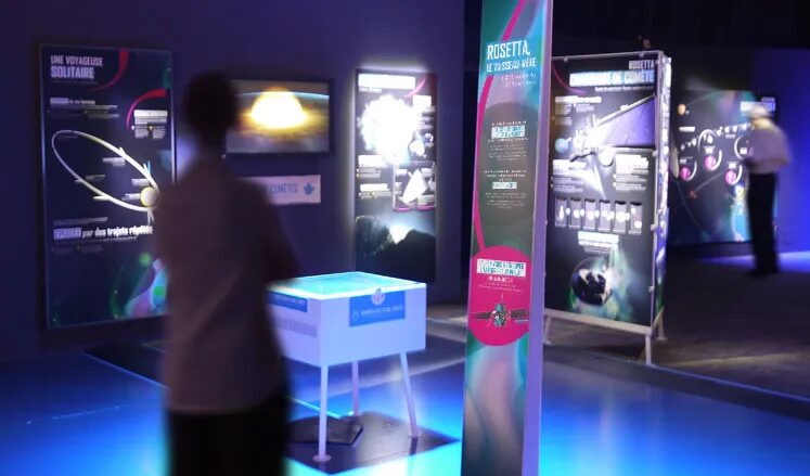 Design scenography, travelling exhibition, Cité de l'Espace - Rosetta room, comets, light panels, interactive terminals by cubedesigners